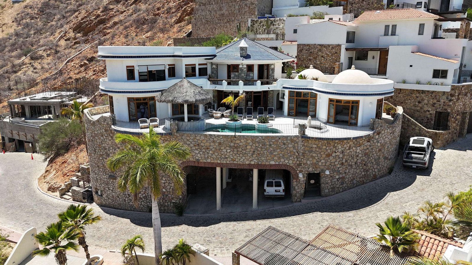 Cabo San Lucas Pedregal Csl Commandingly positioned in the exclusive enclave of Pedregal, Casa El Castillo offers rare walkable proximity to downtown alongside total hillside privacy. This 6-bedroom, 7.5-bathroom architectural estate--originally built by fitness icon Ray Wilson--was masterfully oriented to maximize its vantage point. The result is a breathtaking, unobstructed panorama spanning the Cabo San Lucas Marina, vibrant city lights, and dramatic – 175 Camino Grande, Cabo San Lucas, BS