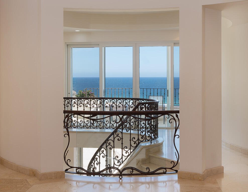 Cabo San Lucas Pedregal Csl Villa Marcella sits on an exquisite piece of ocean front property in the exclusive community of Pedregal in Cabo San Lucas. This 6 bedroom 9 bathroom beach estate has a very private location with it's natural mountainside to it's left that make it perfect for entertaining large beach parties, family gatherings, it has even been known to host quite a few a weddings. The beach estate consists of outdoor fire pit, Olympic size swimming pool, jacuzzi, outdoor cooking area, indoor game and bar room accessible from the beach. Enjoy the long beach walks and beautiful Pacific sunrises and sunsets from this beach home. Excellent INVESTMENT property or private home on the beach. for sale