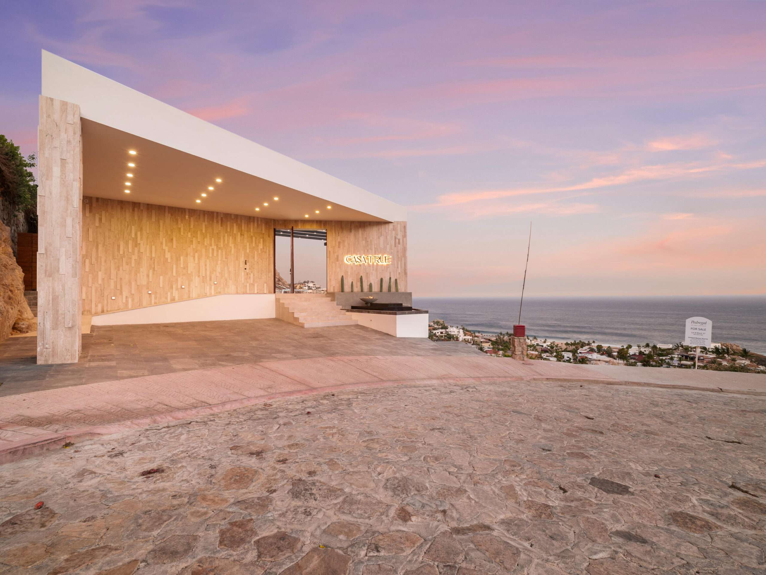 Cabo San Lucas Pedregal Csl Where the Pacific Becomes Your BackyardSome homes simply house you. This one transforms you.Perched in the coveted enclave of Pedregal -- Cabo San Lucas's most prestigious address -- this five-bedroom, six-and-a-half-bathroom estate is not just a property. It's a declaration. A fully furnished masterpiece where every room was designed with a single purpose: to make you feel like the most important person in the world, because here, you are.Step inside and the ocean doesn't just greet you -- it commands the room. A sweeping open-frame window turns the Sea of Cortez into living art, framed by handcrafted parota wood furniture that brings warmth, soul, and a sense of timeless Mexican craftsmanship to every gathering. Sunsets here aren't something you watch. They're something you host. The smart bedrooms offer panoramic ocean – L12 M337 Desnudos Camino del Sol Y, Cabo San Lucas, BS
