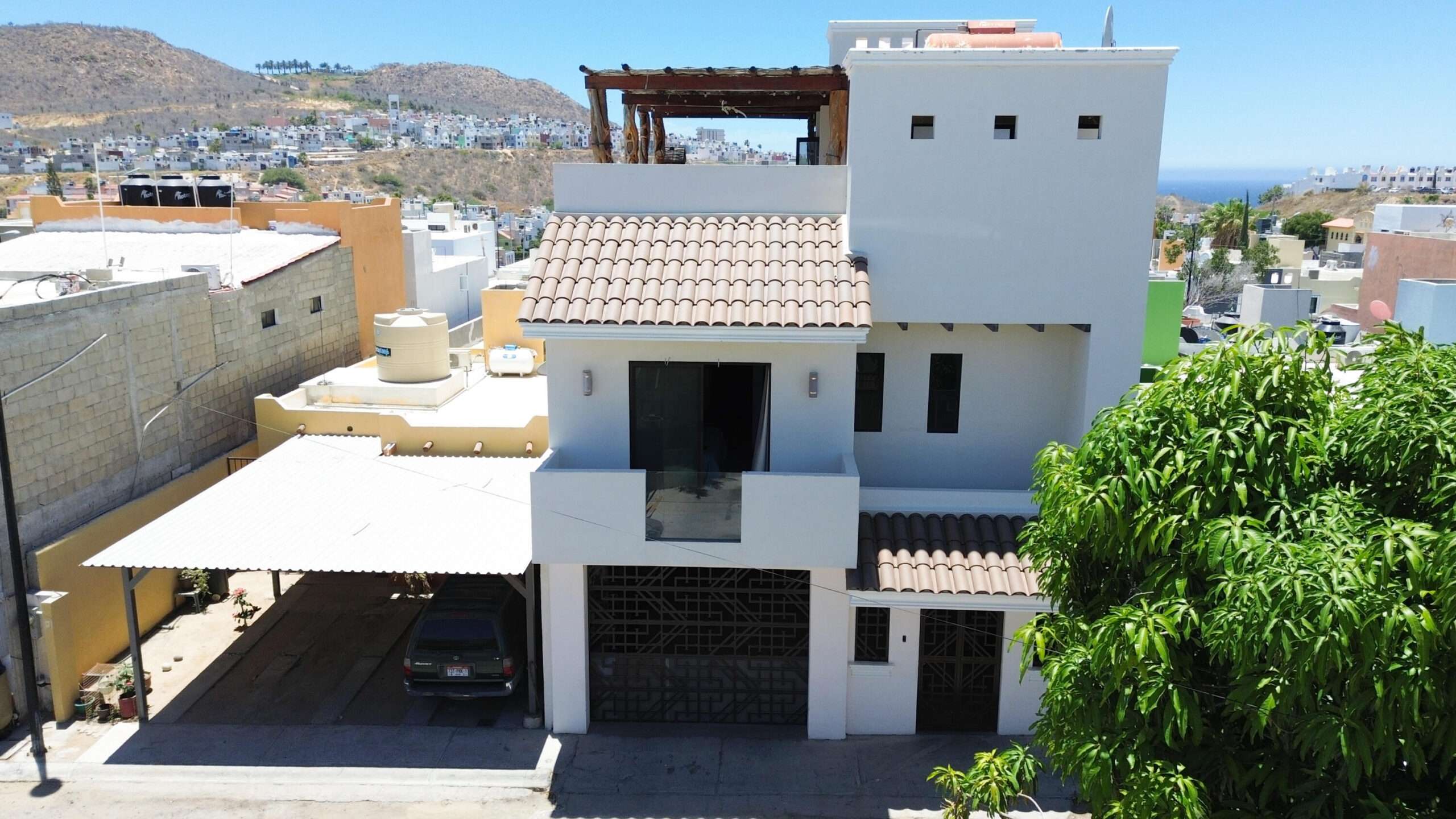Cabo San Lucas Miramar Discover this stunning home located in the desirable Miramar area, thoughtfully designed to offer spacious living, comfort, and exceptional entertainment spaces.This beautiful two-story residence features 5 spacious bedrooms, 5 full bathrooms, and 1 half bathroom, with a modern layout that maximizes natural light and seamless indoor-outdoor living.The main level includes a fully equipped modern kitchen, open-concept living and dining areas, a convenient laundry room, and a two-car garage. Large windows and well-designed spaces create a bright and welcoming atmosphere throughout the home. The highlight of the property is its impressive rooftop entertainment area, perfect for hosting family and friends. It features a built-in BBQ grill, sink, two additional half bathrooms, a cozy fire pit, and a beautiful swimming pool, creating the ideal setting to enjoy outdoor living and breathtaking sunsets.Located in a peaceful and growing neighborhood, Miramar offers convenient access to schools, shopping centers, restaurants, beaches, and the main roads connecting all of Los Cabos. for sale